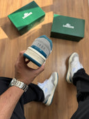 TÊNIS LACOSTE Tenning 1933 - Marinho / Off White